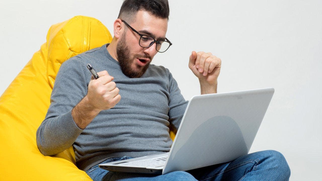 guy rejoice while working laptop guy rejoice while working laptop